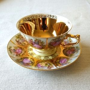 Hand Painted Love story cup and saucer.